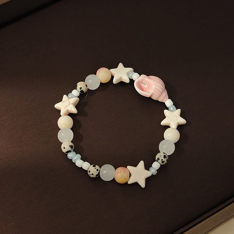 海星、贝壳与粉彩圆珠组合手串